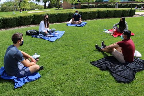 A group of OUWB students during the Lawn on the Lunch series.