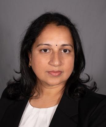 Professional headshot of Bhavani Koneru